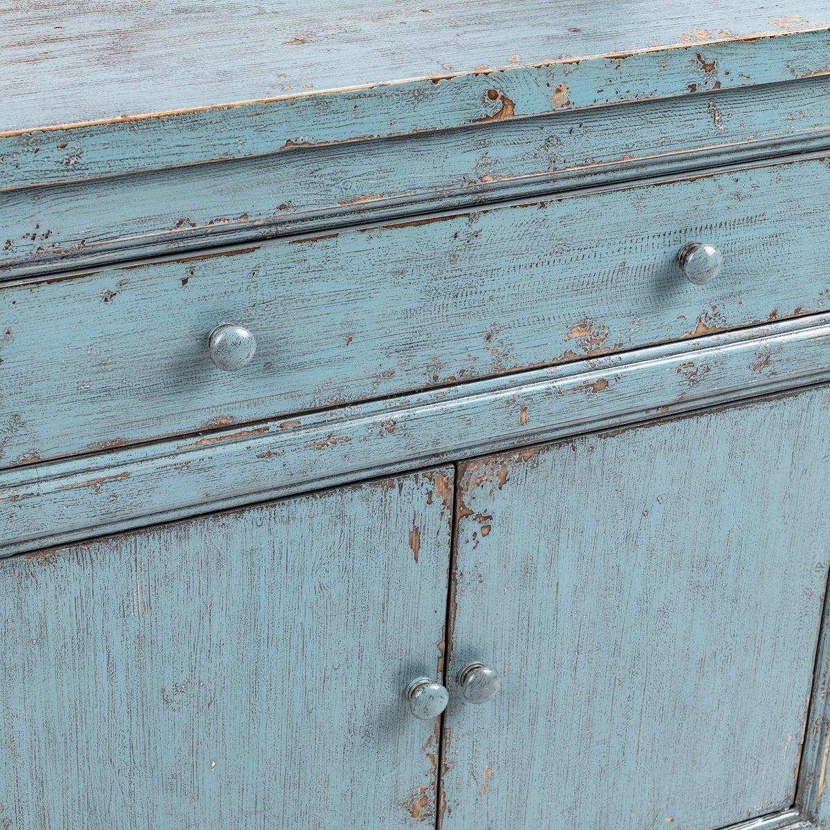 Classic Home Winford 3-drawer, 6-door buffet cabinet with wood finish and ample storage space.