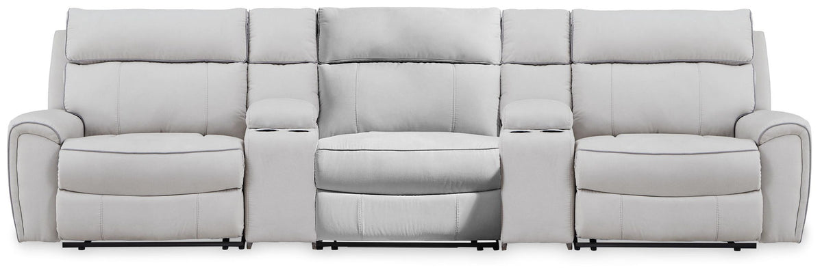 Signature Design by Ashley reclining sectional sofa with plush cushions and modern design, perfect for comfortable living rooms.