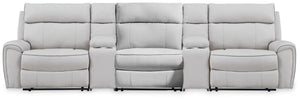 Signature Design by Ashley reclining sectional sofa with plush cushions and modern design, perfect for comfortable living rooms.