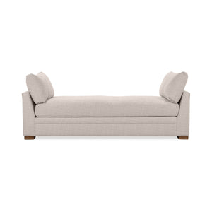 Classic Home Audrey daybed with a wooden frame and upholstered cushions, showcased in a cozy living space.