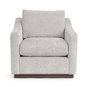 Classic Home Aspen accent arm chair with plush fabric upholstery and wooden legs, stylishly designed for comfortable seating.