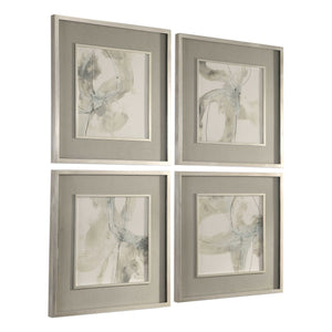 Set of four beige framed prints featuring abstract divination art by Uttermost, displayed together on a wall.