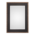 Uttermost Staveley Rustic Black Wall Mirror with a textured wooden frame, stylish and versatile for modern or rustic decor.
