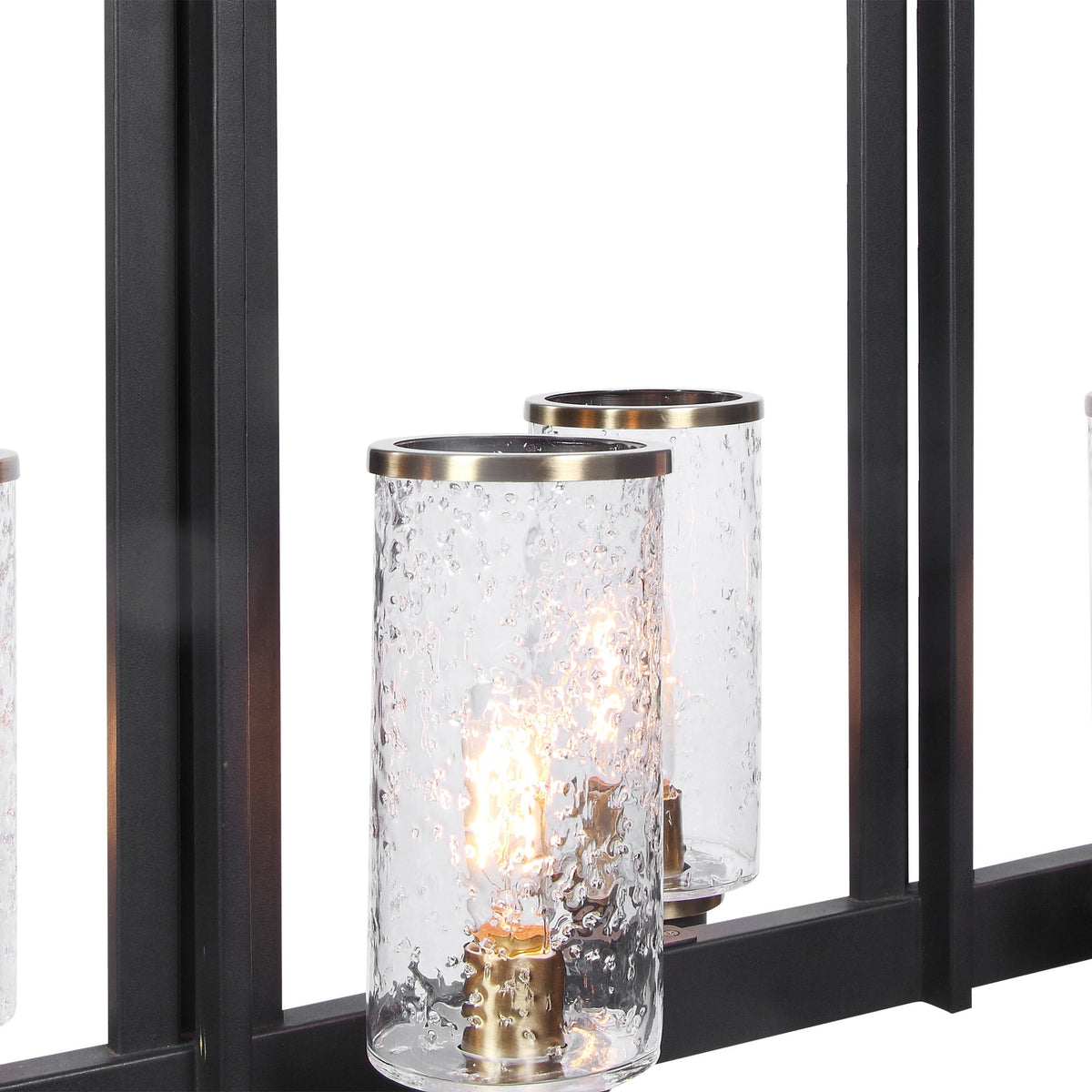 Uttermost Jarsdel 6-light industrial island pendant lighting in black with metal jars, ideal for modern kitchen or dining area decor.