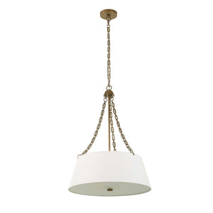 Uttermost Andalucia 4-light gold and white drum pendant lighting fixture hanging from ceiling.