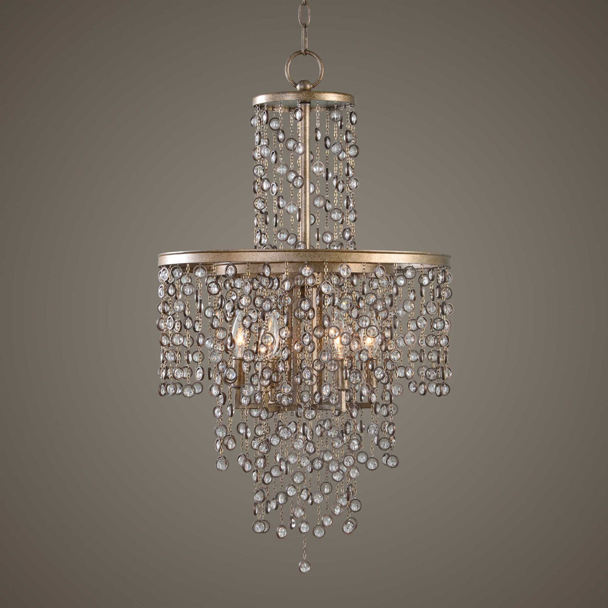 Uttermost Valka 6-light crystal chandelier with light brown finish, featuring elegant hanging crystal accents and a modern design.