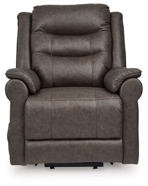 Signature Design by Ashley Oatman Power Lift Recliner in a comfortable fabric with padded armrests and a reclining footrest.