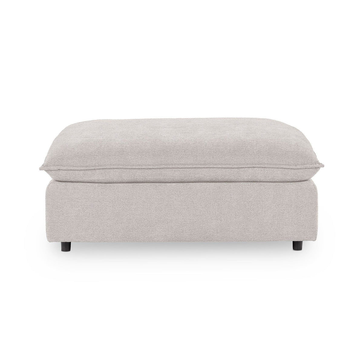 Classic Home Caplan upholstered ottoman with a cushioned top and wooden legs, ideal for living room or bedroom decor.
