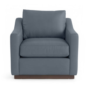 Classic Home Aspen accent arm chair with plush upholstery and wooden legs, stylishly designed for living room decor.