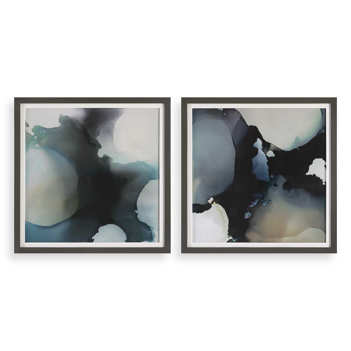 Set of two black abstract framed prints with telescopic design by Uttermost, featuring modern wall art with sleek black frames.