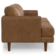 Livingston upholstered stationary sofa by Simpli-Home with plush fabric and cushioned armrests in a modern living room setting.