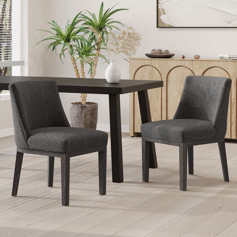 Set of two Noble House modern dining chairs with durable fabric upholstery and sturdy wooden frames, shown in a stylish dining room setting.