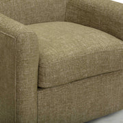 TOV Furniture Thao swivel chair with a modern design, featuring a cushioned seat and backrest on a rotating base.