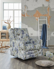 Signature Design by Ashley Dustinford swivel glider accent chair in multi fabric, showcasing a comfortable, stylish seating option.