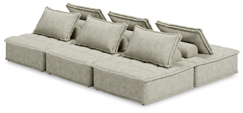 Signature Design by Ashley Bales stationary sectional sofa with plush cushions and modern design, shown in a living room setting.