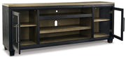 Foyland - XL TV Stand w/Fireplace Option - Black / Brown - R&R Furniture Gallery (Fountain Valley, CA)