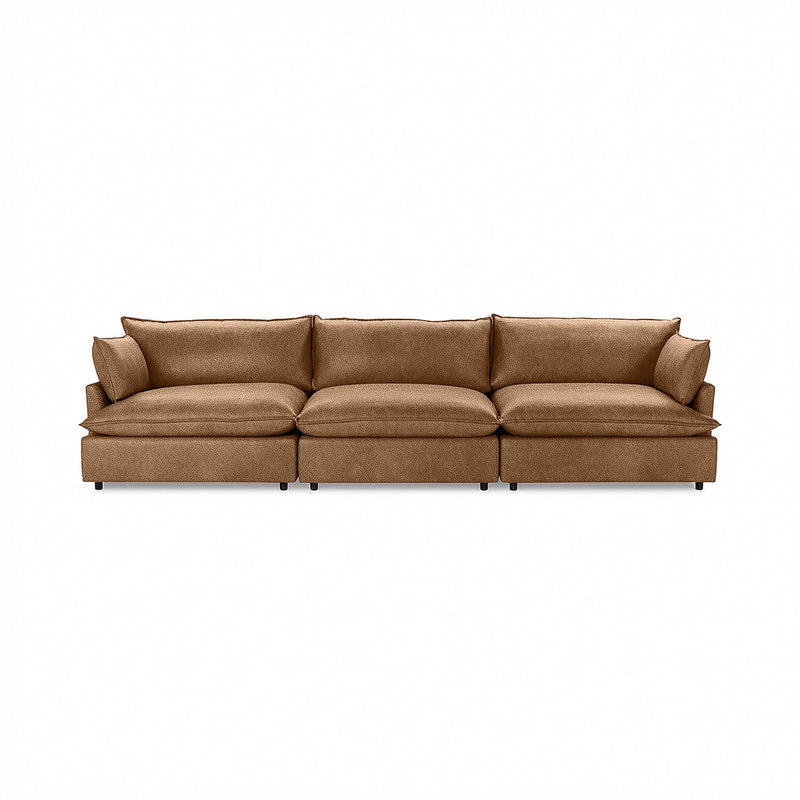 Modern Caplan stationary sectional sofa by Classic Home with plush cushions and sleek design in a contemporary living room setting.