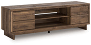 Signature Design by Ashley Zadilyn TV stand with fireplace option, featuring a modern wood finish and spacious storage compartments.