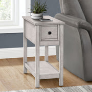 8th Street accent end table with two tiers, narrow design, storage drawer, and lamp on top, featuring a charming style.