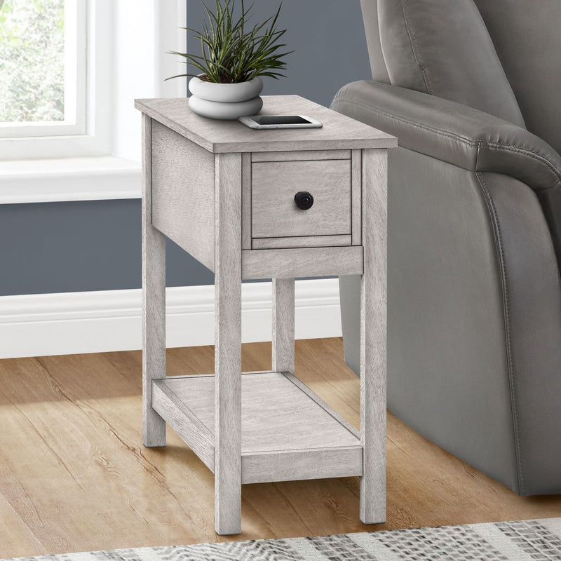 8th Street accent end table with two tiers, narrow design, storage drawer, and lamp on top, featuring a charming style.