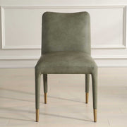 Set of two Uttermost Conifer dining chairs with wooden legs and upholstered seats, modern design for dining room decor.