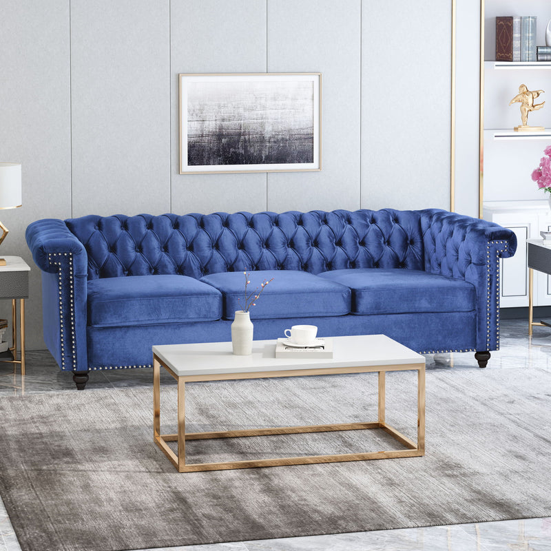 Noble House Chesterfield style 3-seater sofa with deep button tufting and plush upholstery in a classic stationary sofa design.