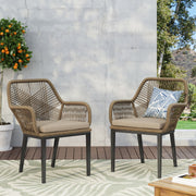 Modern wicker arm chair by Noble House with water-resistant beige cushions and brown wicker frame for stylish outdoor dining.