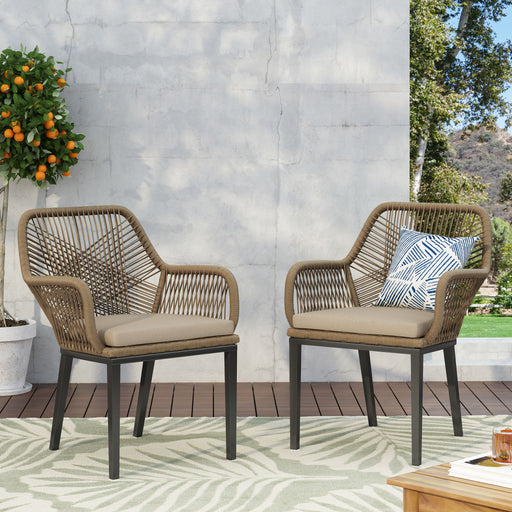 Modern wicker arm chair by Noble House with water-resistant beige cushions and brown wicker frame for stylish outdoor dining.