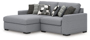 Benchcraft Bealton stationary sectional sofa with plush fabric cushions and modern design, shown in a cozy living room setting.