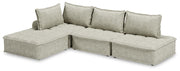 Signature Design by Ashley stationary sectional sofa with plush cushions and modern design, shown in a living room setting.
