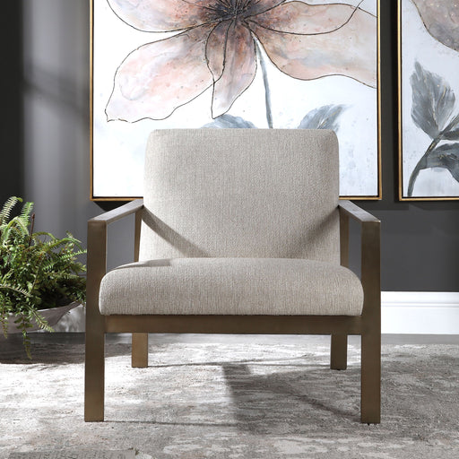 Contemporary beige accent arm chair by Uttermost with plush upholstery and sleek design, perfect for modern living spaces.