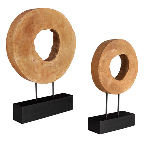 Pair of Uttermost Ashlea wooden sculptures in light brown and black, featuring modern abstract figurine designs.