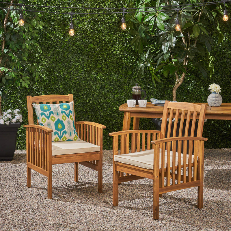 Noble House Casa acacia dining chair set with cushioned seats and backrests, featuring a stylish wooden design for dining rooms.
