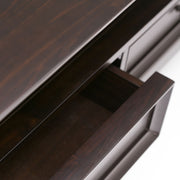 Hickory brown Amherst coffee table by Simpli-Home featuring a rectangular wooden surface and sturdy legs in a modern design.