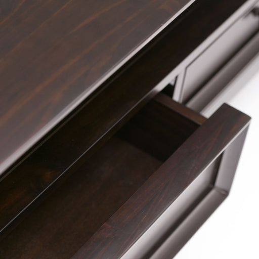 Hickory brown Amherst coffee table by Simpli-Home featuring a rectangular wooden surface and sturdy legs in a modern design.