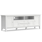 Handcrafted Warm Shaker TV media stand by Simpli-Home featuring wooden shelves and storage compartments for media devices.