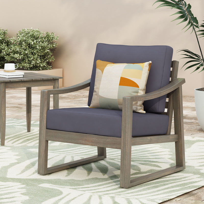 Noble House Samwell outdoor club arm chair with cushioned seat and backrest for patio or garden relaxation.