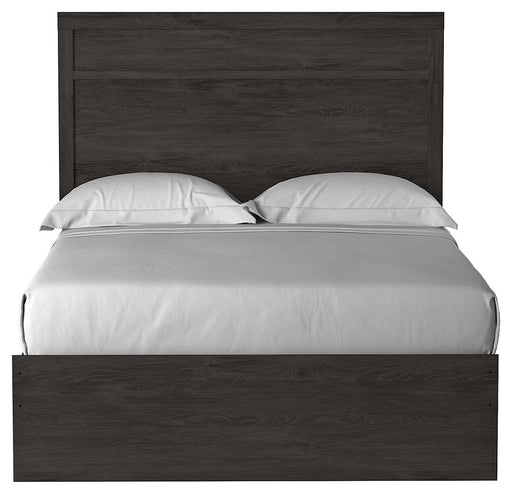 Signature Design by Ashley Belachime 5-piece bedroom set with a bed, dresser, mirror, nightstands, and matching bedroom furniture.