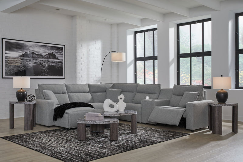 Signature Design by Ashley Modmax II reclining sectional in salt and pepper fabric, featuring plush cushions and reclining seats.