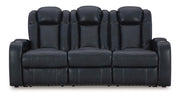 Signature Design by Ashley Fyne-dyme power reclining sofa with adjustable headrest, featuring plush cushions and modern style.