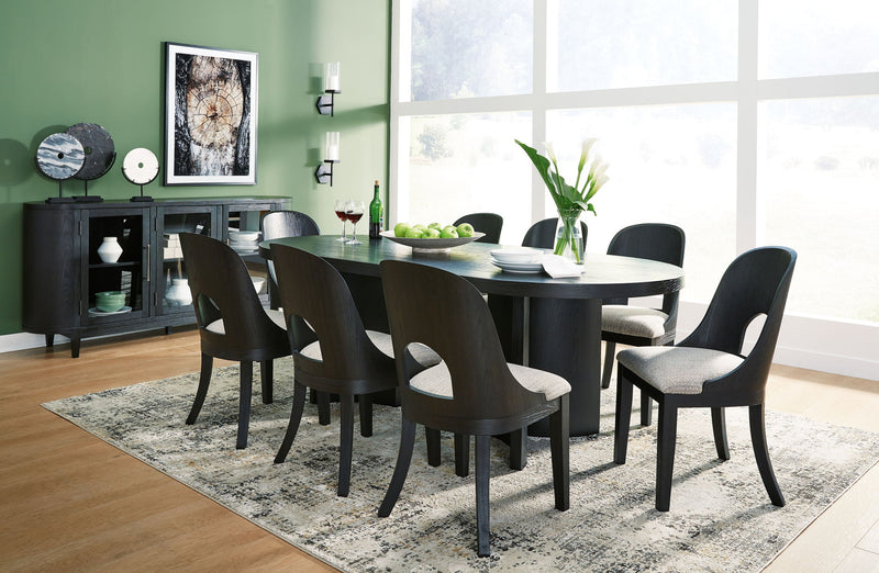 Signature Design by Ashley Rowanbeck 5-piece dining room set with a wooden table and matching chairs in a modern kitchen setting.