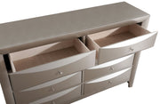 Glory Furniture Marilla dresser with four drawers and sleek wooden finish, modern bedroom storage solution.