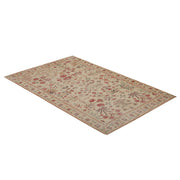 TOV Furniture Jardin 5x8 hand-woven wool area rug in brown with intricate patterns and soft texture.