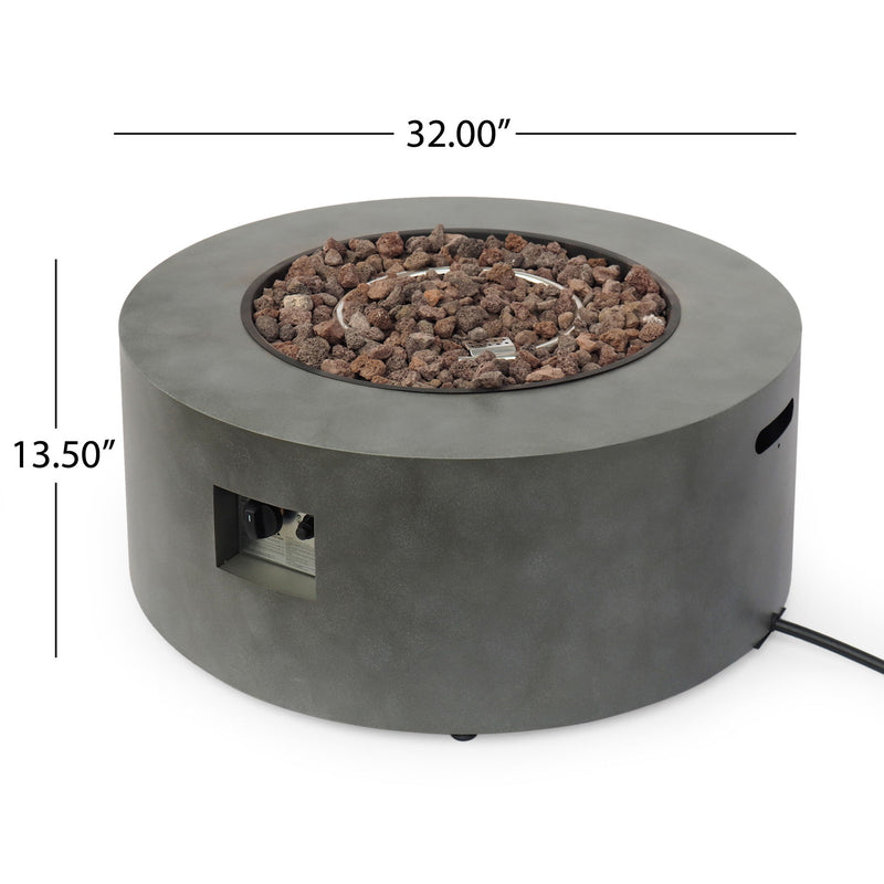 Round iron fire pit by Noble House with a 40,000 Btu burner, perfect for outdoor heating and cozy gatherings.