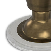 Leyla side table by Simpli-Home with antique brass finish, featuring a sleek round top and slender legs for modern decor.