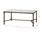 Uttermost Warring iron coffee table with a round top and sleek metal frame, modern style for living room decor.