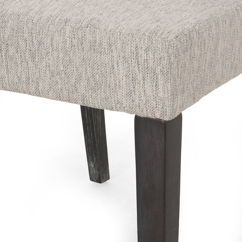 Contemporary Noble House dining chair with upholstered seat and tapered wooden legs, part of a stylish chair set.