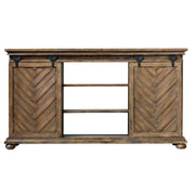 Uttermost Primalia barn door media console in light brown wood with black metal accents, designed for TV and media storage.