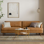 Livingston upholstered stationary sofa by Simpli-Home with plush fabric and padded armrests in a cozy living room setting.
