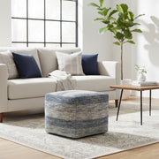 Simpli-Home square upholstered clay-colored accent pouf, soft fabric with tufted top, versatile for living room or seating area.
